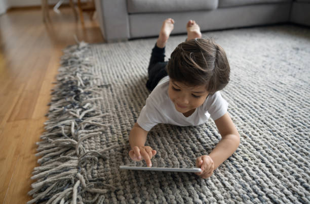 Girl lying on rug | McCools Flooring