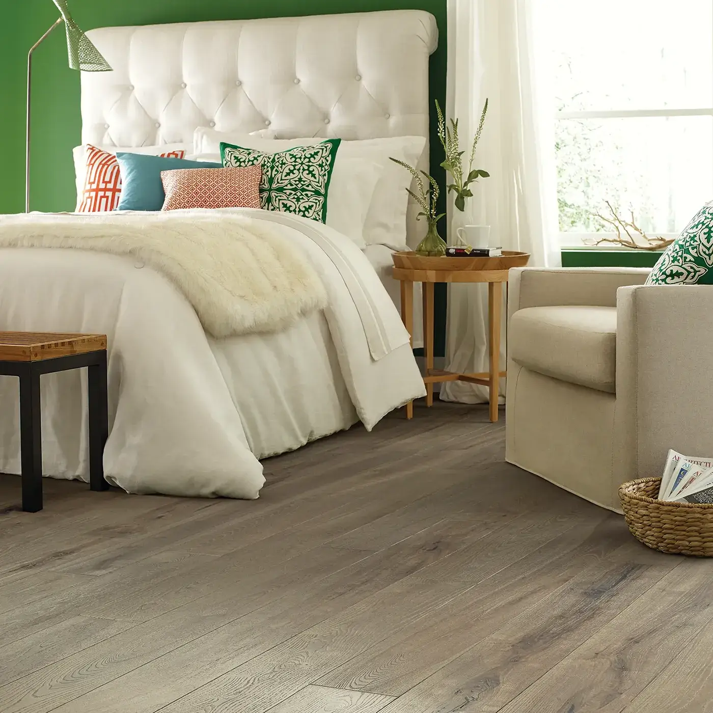 2W745_07028_ROOM Gray-toned hardwood in a bedroom with a white tufted headboard | McCool's Flooring