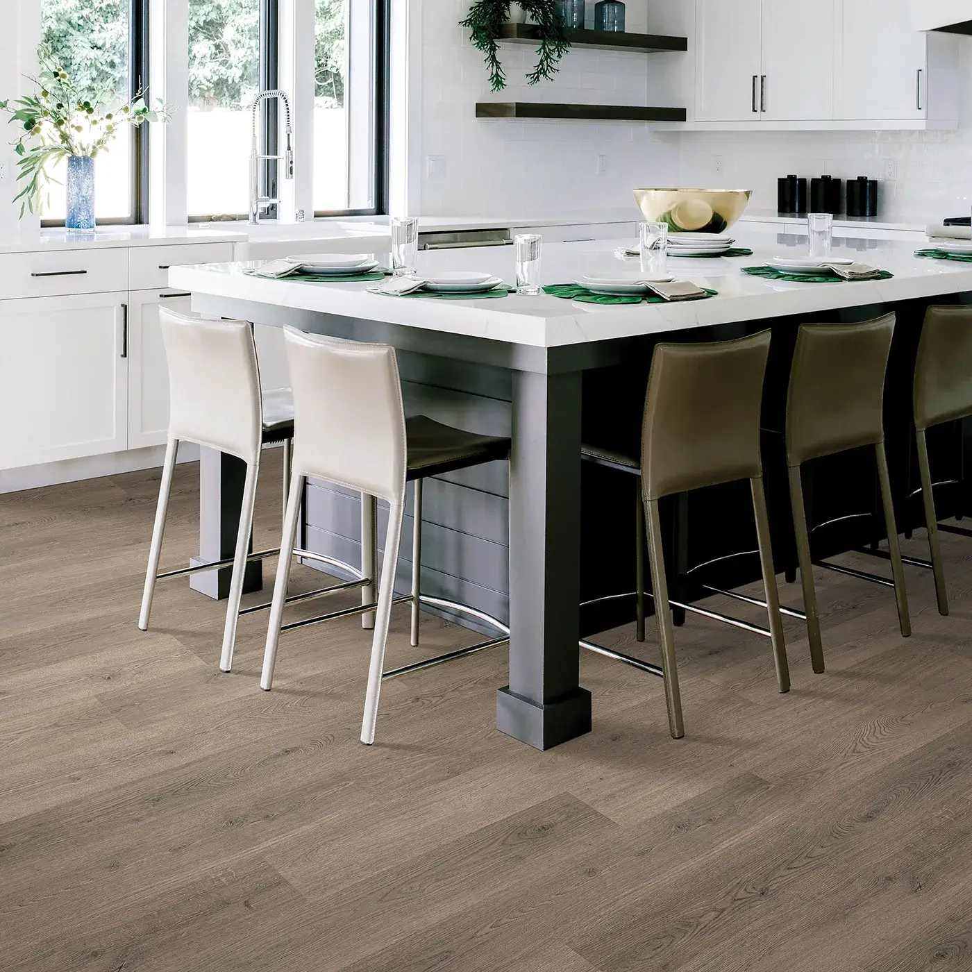 33619_958_room Mohawk Laminate in a gray-brown wood tone in a modern kitchen | McCool's Flooring