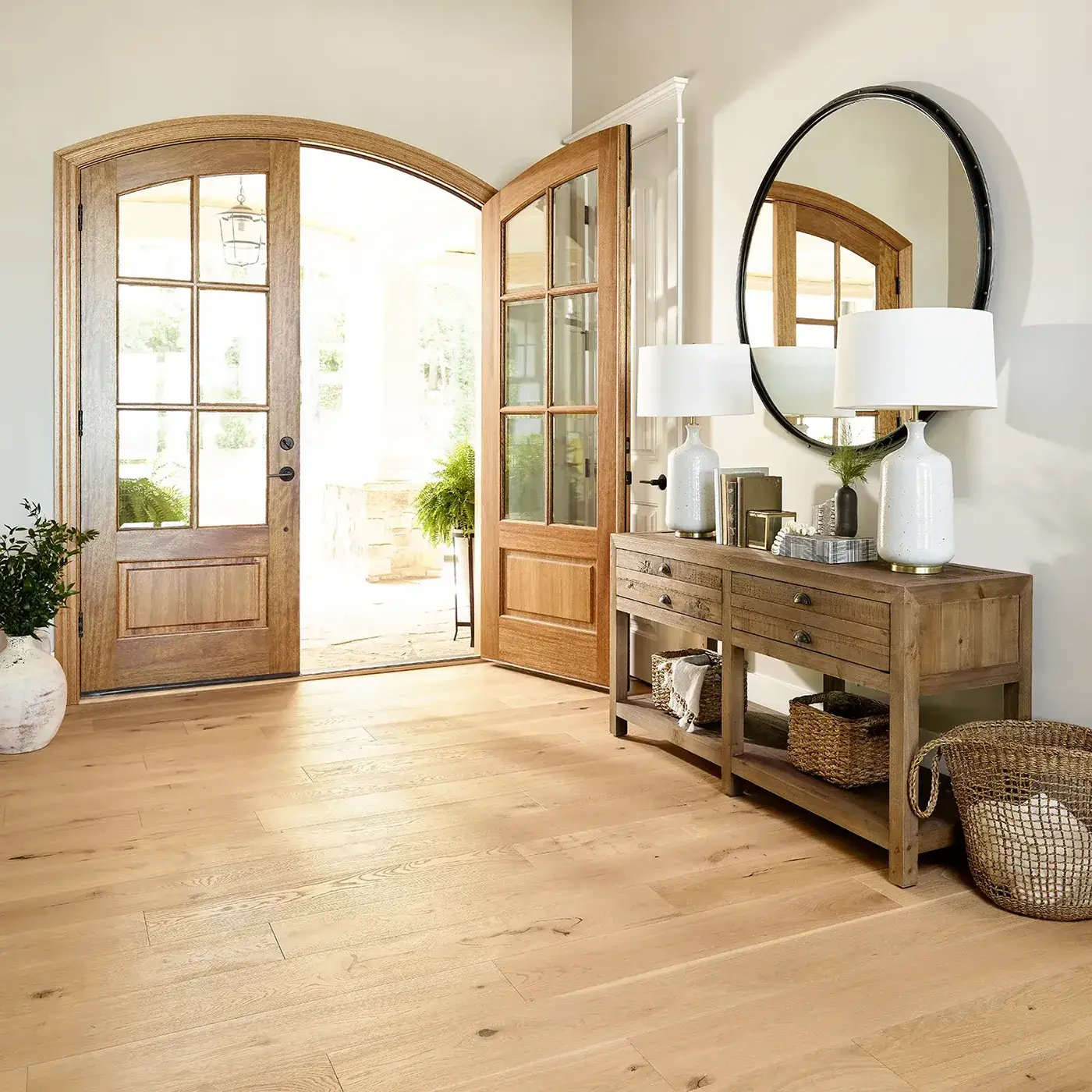 CastlewoodOak-SW485-00146-Tapestry-EntryWay-2U252 Shaw Floors light hardwood in an entryway with large wooden double doorsy | McCool's Flooring