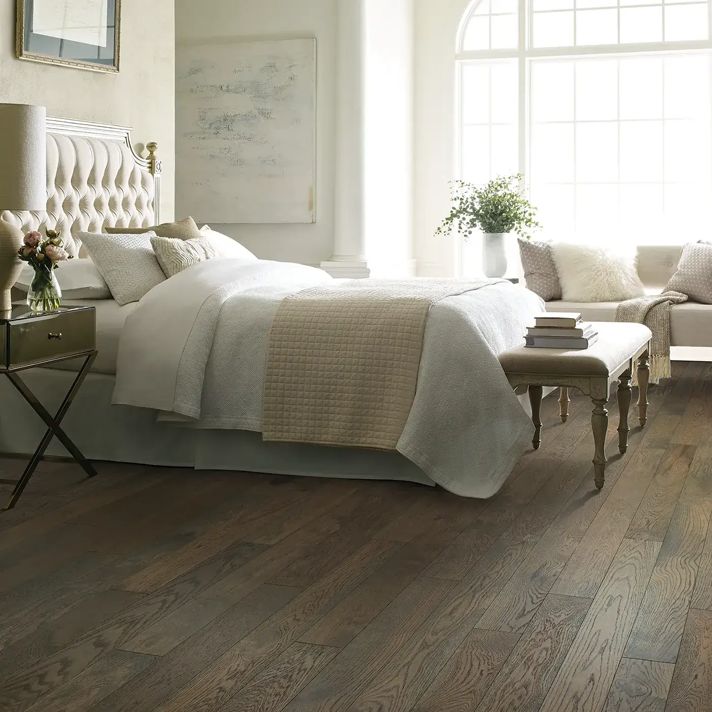 CornerstoneOak-SW676-07038-Sandstone-5in-RM Shaw Floors medium brown Hardwood in a bedroom | McCool's Flooring